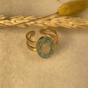 Bague Dorée avec Pierre Centrale et Émail Bleu